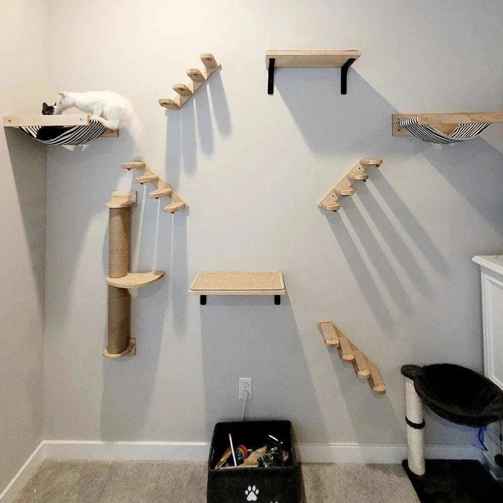 Wall-Mounted Cat Climbing TreeDescription:
Transform your home into a feline paradise with this cat tree. Featuring climbing shelves, a hammock, and a cozy house, your kitten will love their newRegal Pet PalaceRegal Pet PalaceWall-Mounted Cat