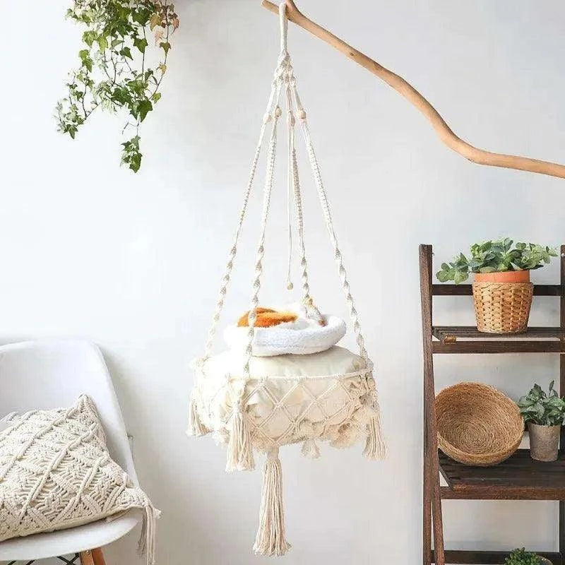 Cozy Cat Hammock SwingDescription:
Give your cat the ultimate lounging spot with this hand-woven hammock. Perfect for relaxation and play, this cozy swing will become your pet's favoriteRegal Pet PalaceRegal Pet PalaceCozy Cat Hammock