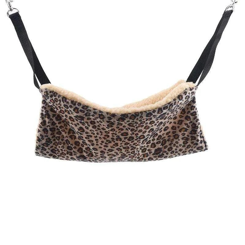 Cozy Cat Hanging HammockDescription:
Give your pet the ultimate nap spot! This soft, double-sided hanging hammock creates a cozy retreat for cats and small animals.
Benefits:
✔ Space-SavRegal Pet PalaceRegal Pet PalaceCozy Cat