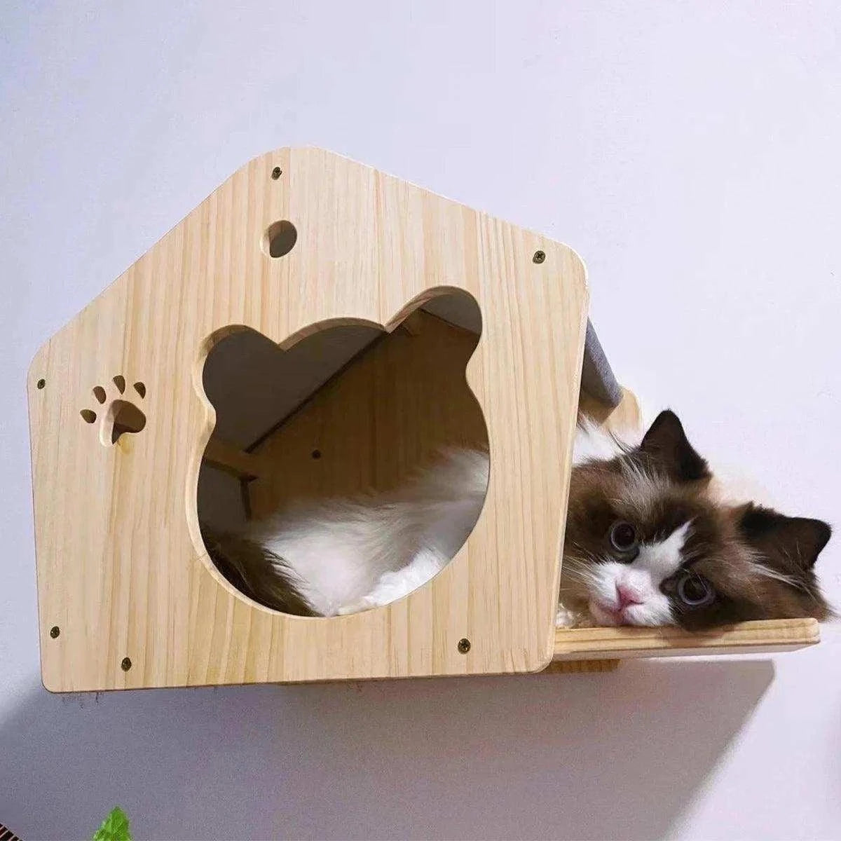 Wall-Mounted Cat Climbing TreeDescription:
Transform your home into a feline paradise with this cat tree. Featuring climbing shelves, a hammock, and a cozy house, your kitten will love their newRegal Pet PalaceRegal Pet PalaceWall-Mounted Cat