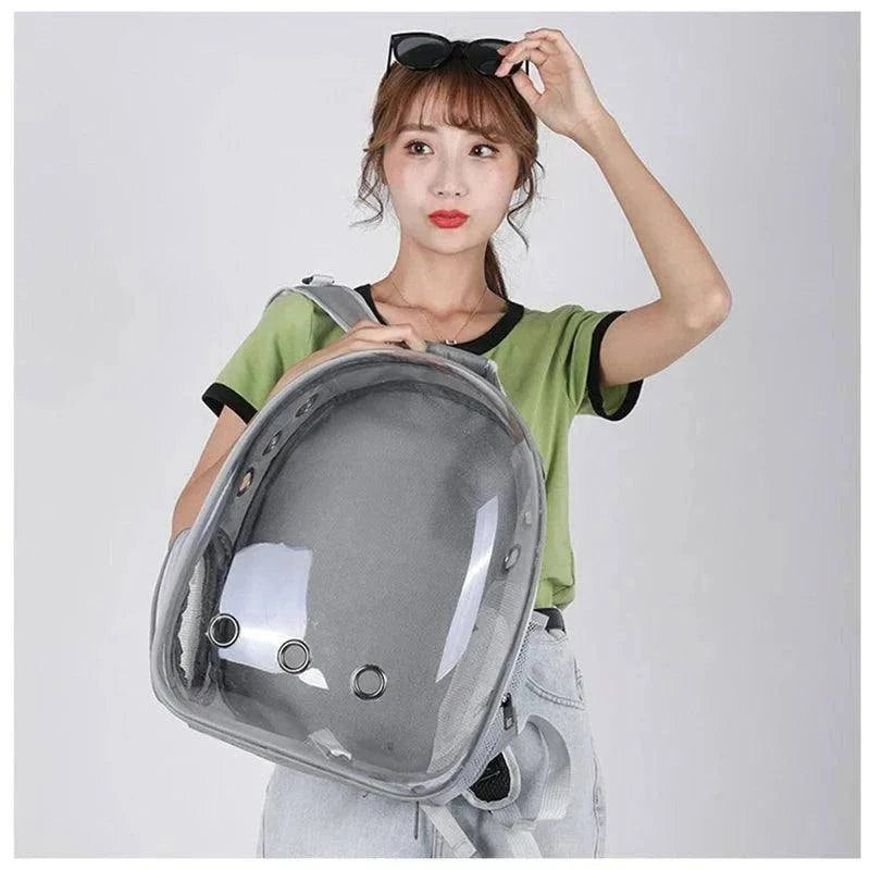 Transparent Cat Travel BackpackDescription:
Turn every outing into an adventure! This breathable, lightweight backpack gives your cat a panoramic view while keeping them safe and comfortable on tRegal Pet PalaceRegal Pet PalaceCat Travel Backpack