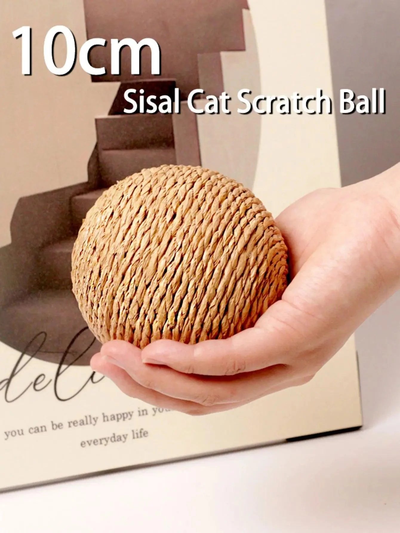 Interactive sisal cat ball for scratching and dental care.