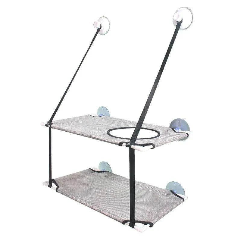 Double-Decker Cat Hammock BedDescription:
Give your cat the ultimate sunbathing spot with this double-decker hammock. Suction cup mounts securely to the window, offering a cozy space for loungiRegal Pet PalaceRegal Pet PalaceDouble-Decker Cat