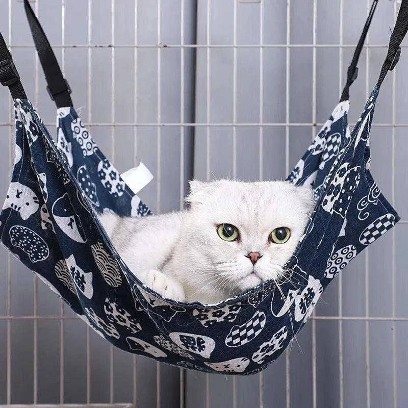 Cozy Canvas Cat HammockDescription:
Every cat deserves a comfy retreat! This double-sided hanging bed provides the perfect snuggly spot for cats, small dogs, and even hamsters to relax anRegal Pet PalaceRegal Pet PalaceCozy Canvas Cat