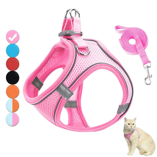 Reflective cat harness set in pink, adjustable and stylish for outdoor safety.