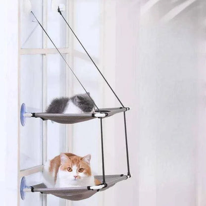 Double-Decker Cat Hammock BedDescription:

Give your cat the ultimate sunbathing spot with this double-decker hammock. Suction cup mounts securely to the window, offering a cozy space for loungiRegal Pet PalaceRegal Pet PalaceDouble-Decker Cat