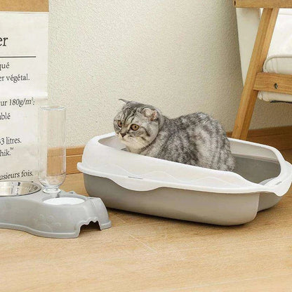 Spatter-Proof Semi-Enclosed Litter BoxDescription:

Say goodbye to messy floors! This semi-enclosed litter box keeps your cat’s space clean and your home odor-free while providing comfort and privacy forRegal Pet PalaceRegal Pet PalaceSpatter-Proof Semi-Enclosed