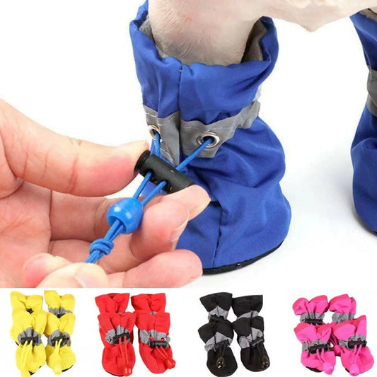 Waterproof puppy rain booties in various colors with anti-slip sole.