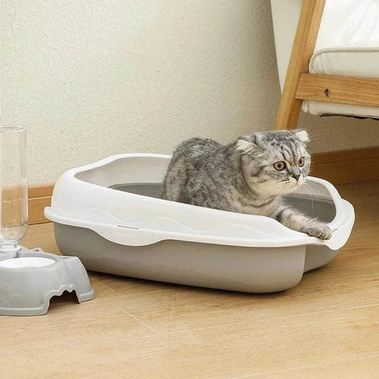 Spatter-Proof Semi-Enclosed Litter BoxDescription:

Say goodbye to messy floors! This semi-enclosed litter box keeps your cat’s space clean and your home odor-free while providing comfort and privacy forRegal Pet PalaceRegal Pet PalaceSpatter-Proof Semi-Enclosed